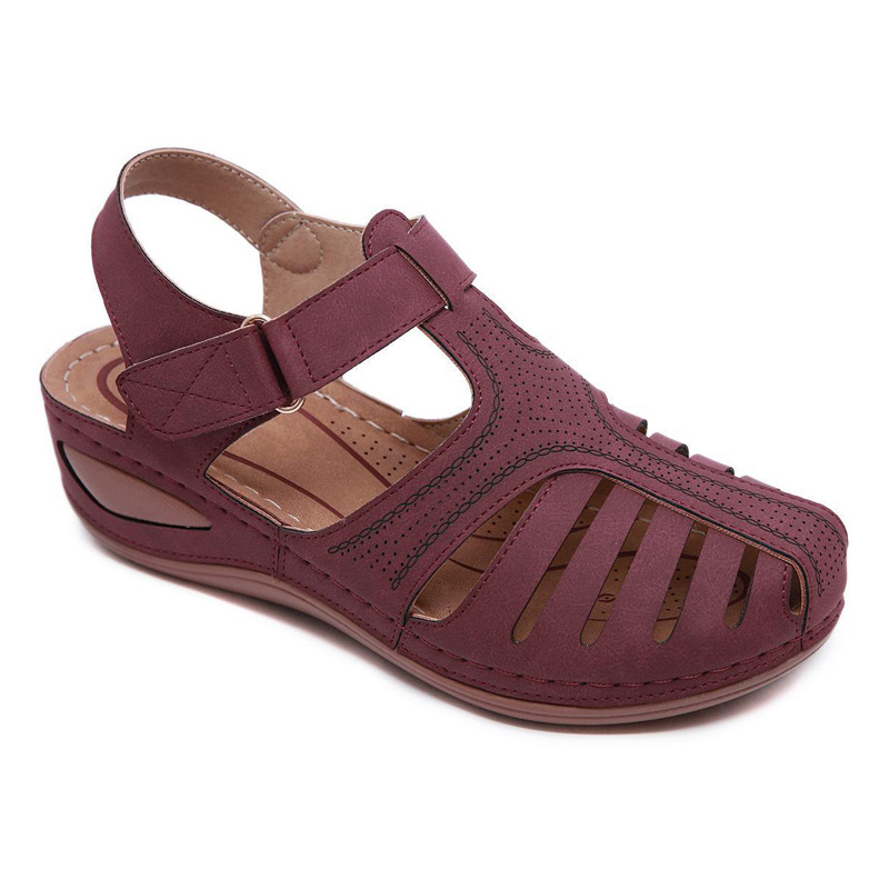 Sandalia ortopédica violeta con cuña