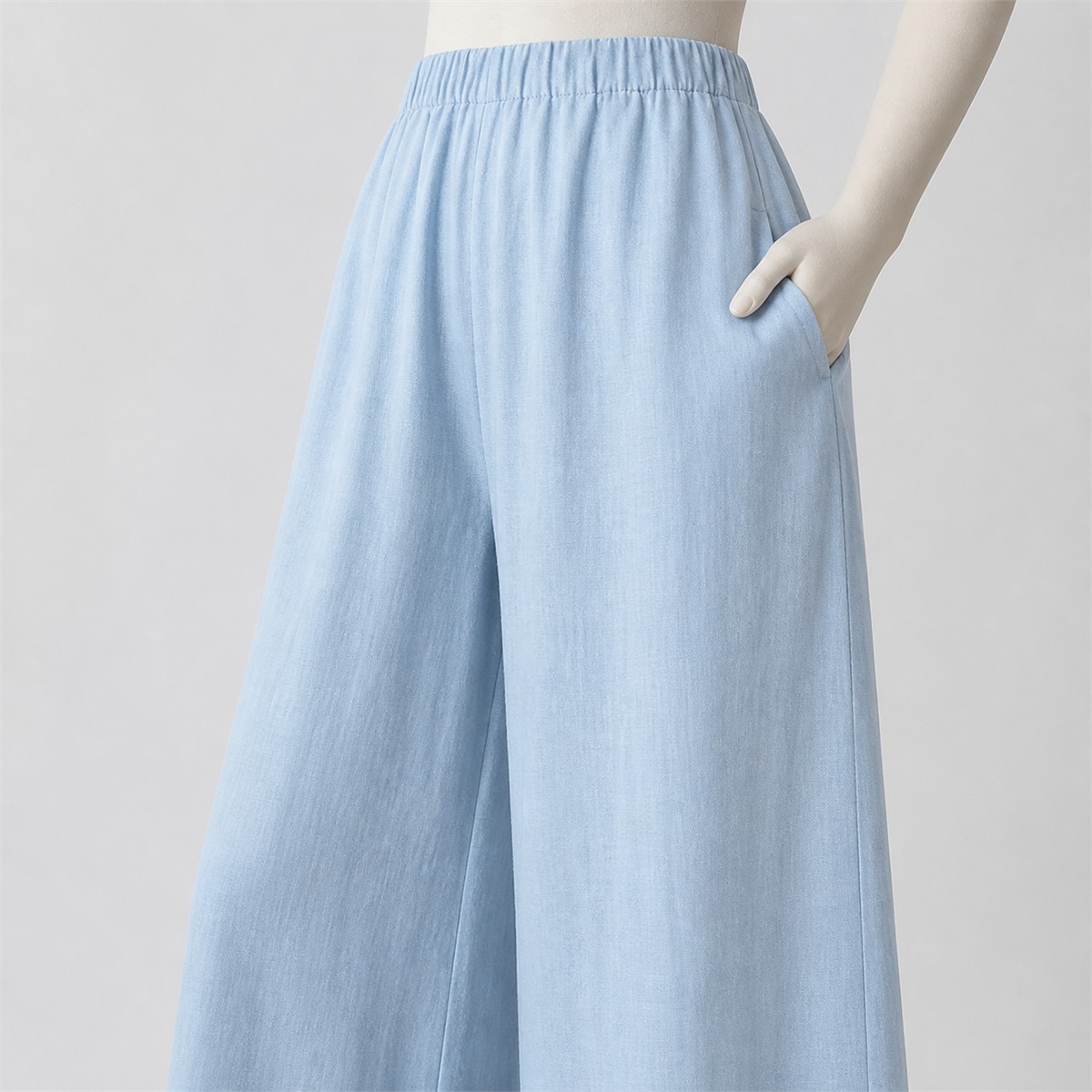 D&eacute;tail de la taille &eacute;lastique, de la poche lat&eacute;rale et du tissu textur&eacute;