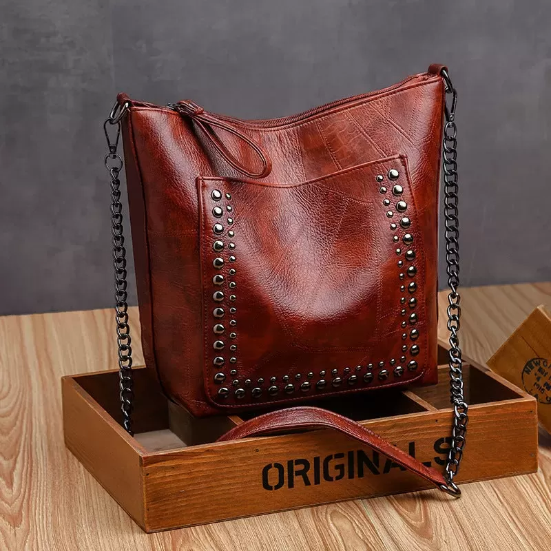 Soft leather studded large capacity crossbody bag