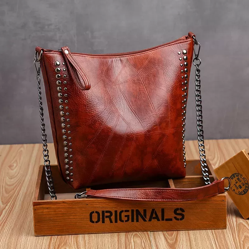 Soft leather studded large capacity crossbody bag