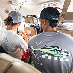 Two men wearing the Huk Graphic Tee Shirt