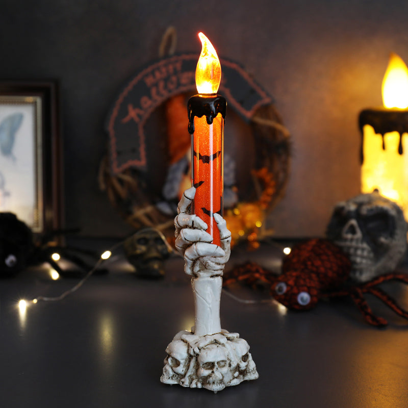 LED candle decoration in the shape of a ghostly hand for Halloween