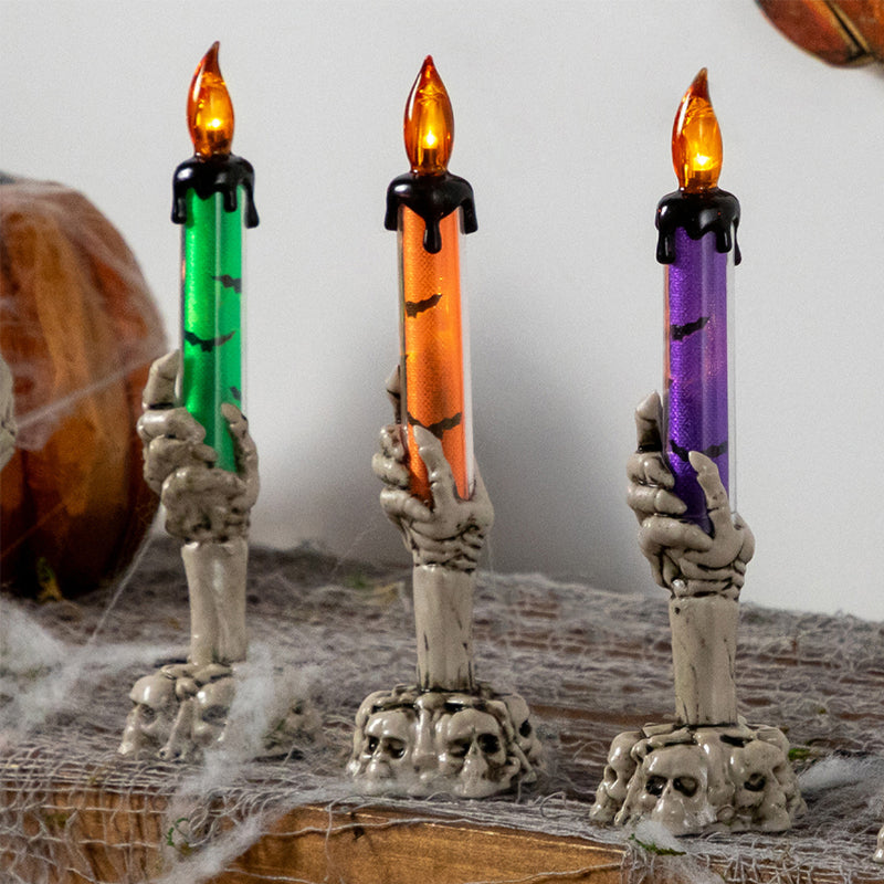 LED candle decoration in the shape of a ghostly hand for Halloween