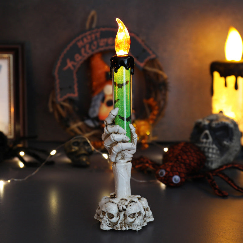 LED candle decoration in the shape of a ghostly hand for Halloween