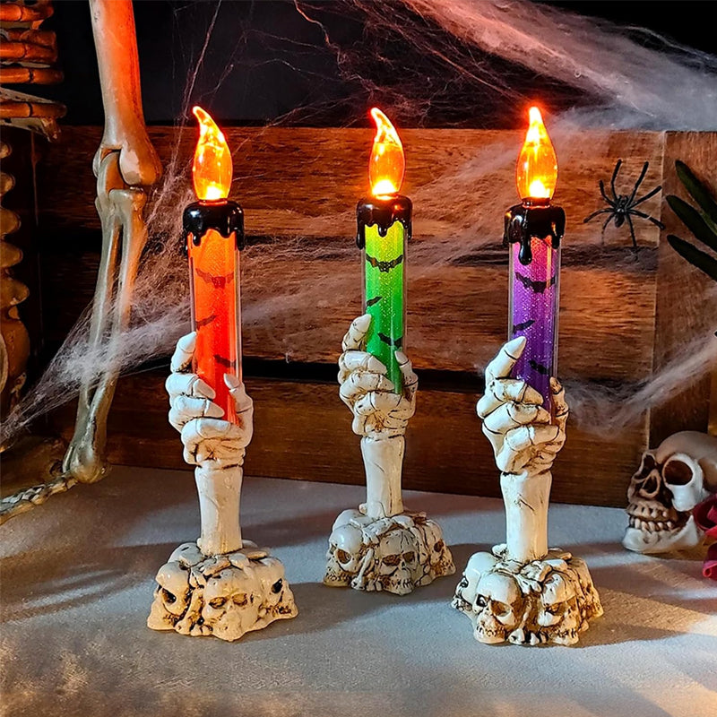 LED candle decoration in the shape of a ghostly hand for Halloween