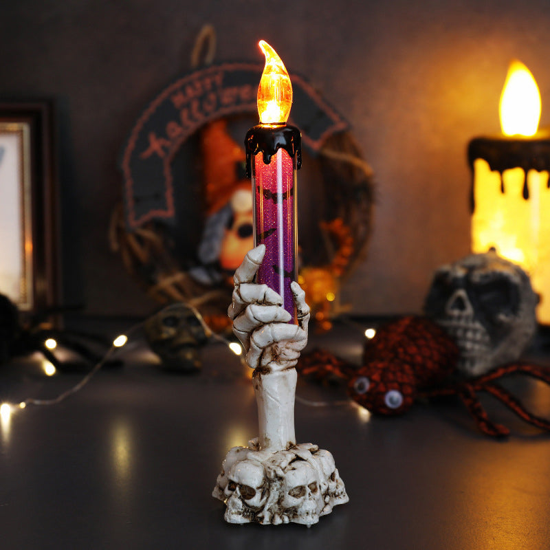 LED candle decoration in the shape of a ghostly hand for Halloween