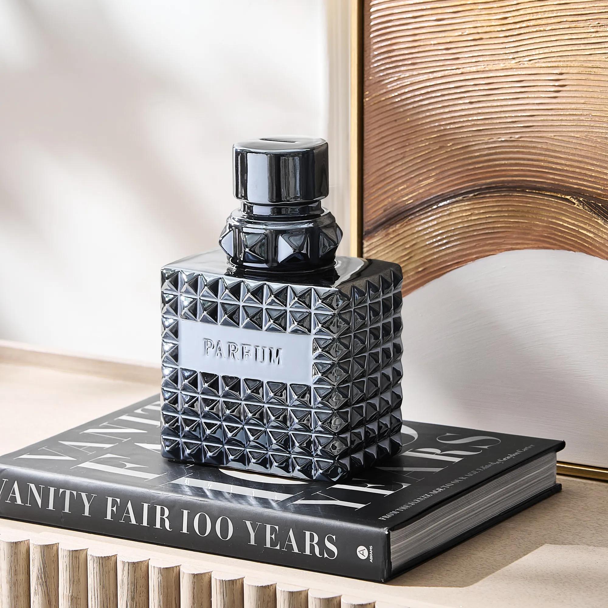 Studded Perfume Coin Bank