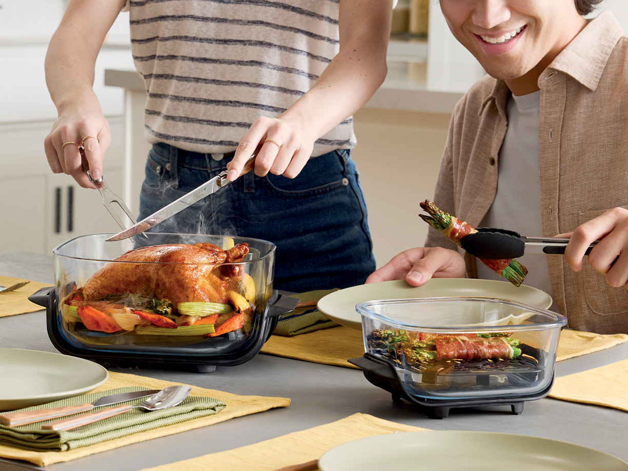 Roast chicken served directly from a glass cooking container