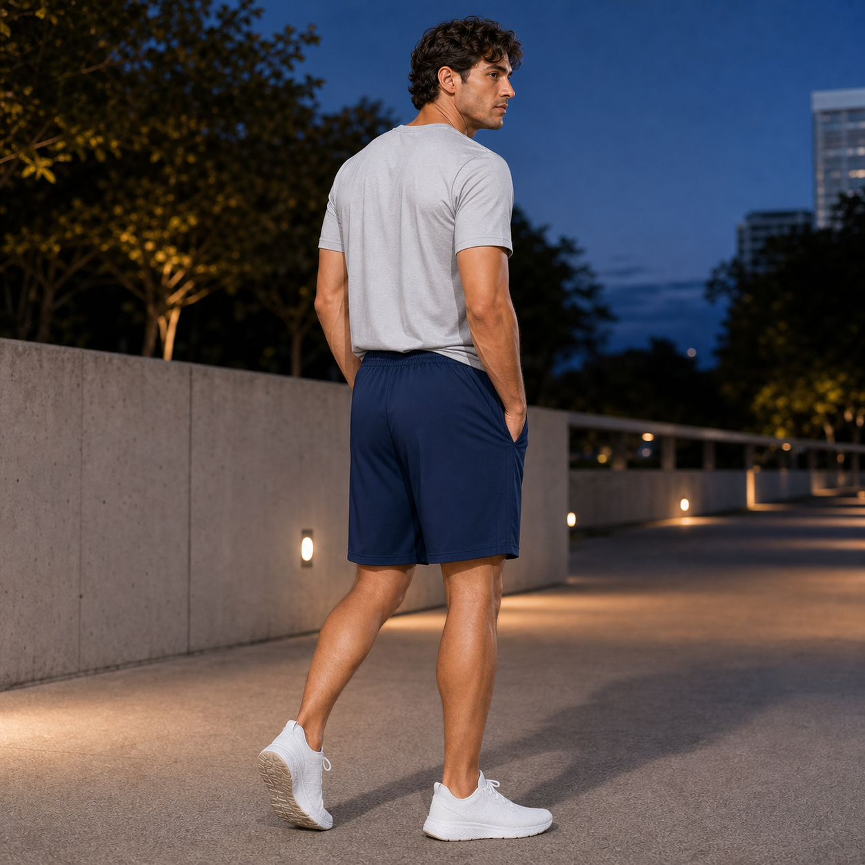 Men's 8-Piece Smooth Polyester Drawstring Athletic Shorts Set - side and back fit view of men's athletic shorts
