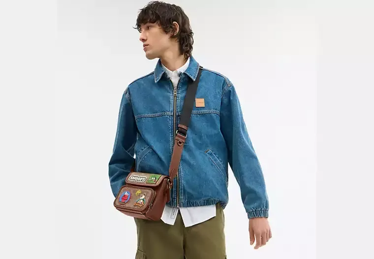 Coach X Peanuts Sullivan Flap Crossbody Bag In Signature Canvas With Patches