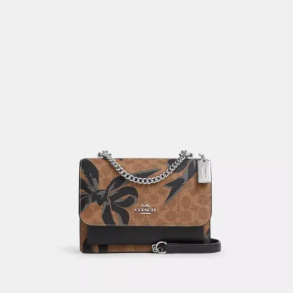 Klare Crossbody Bag In Signature Canvas With Bow Print