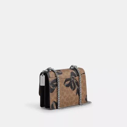 Klare Crossbody Bag In Signature Canvas With Bow Print