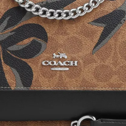 Klare Crossbody Bag In Signature Canvas With Bow Print