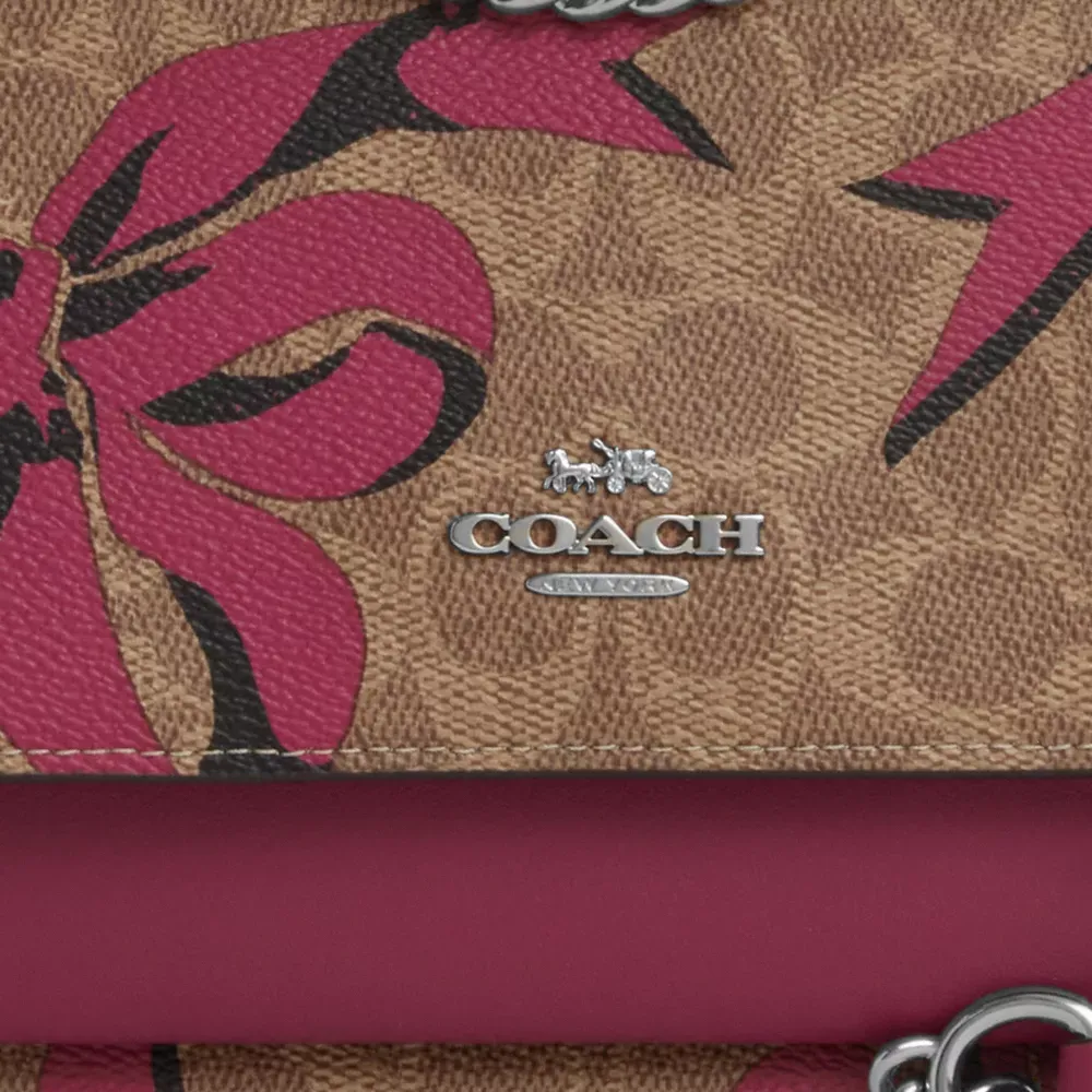 Klare Crossbody Bag In Signature Canvas With Bow Print