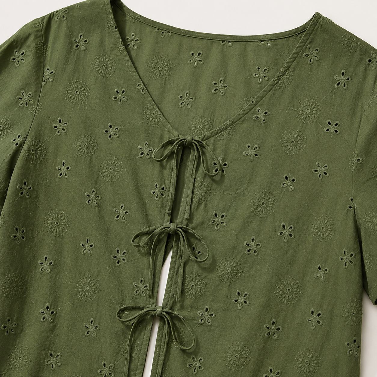 V-neck and front embroidery detail