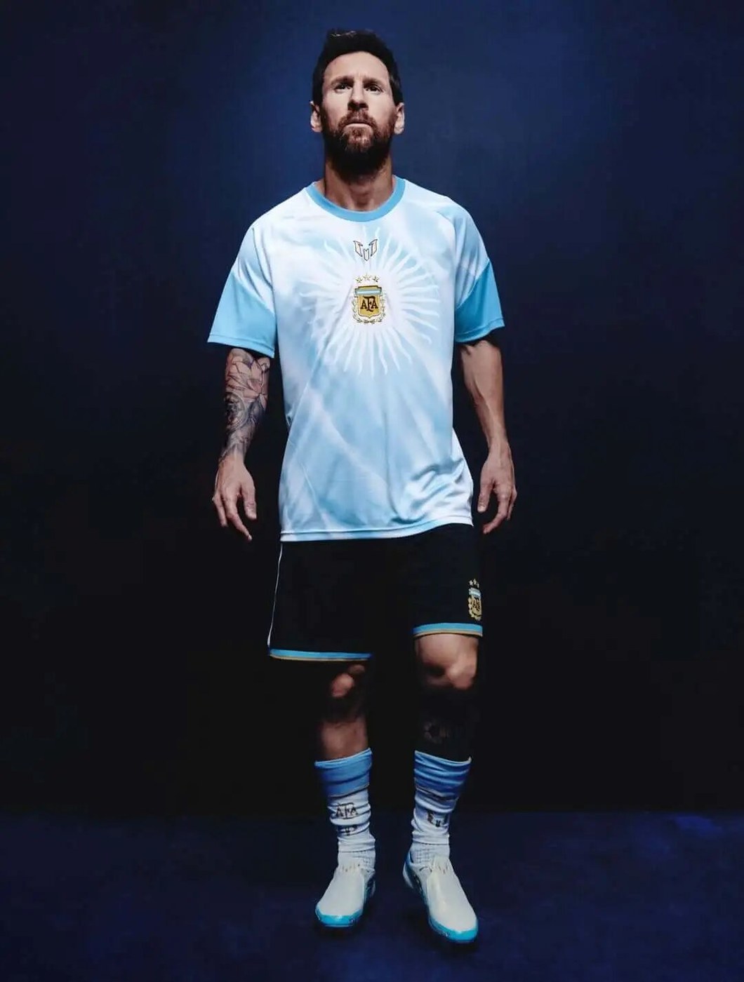 Lionel Messi in the Argentina pre-match top walking out before a match