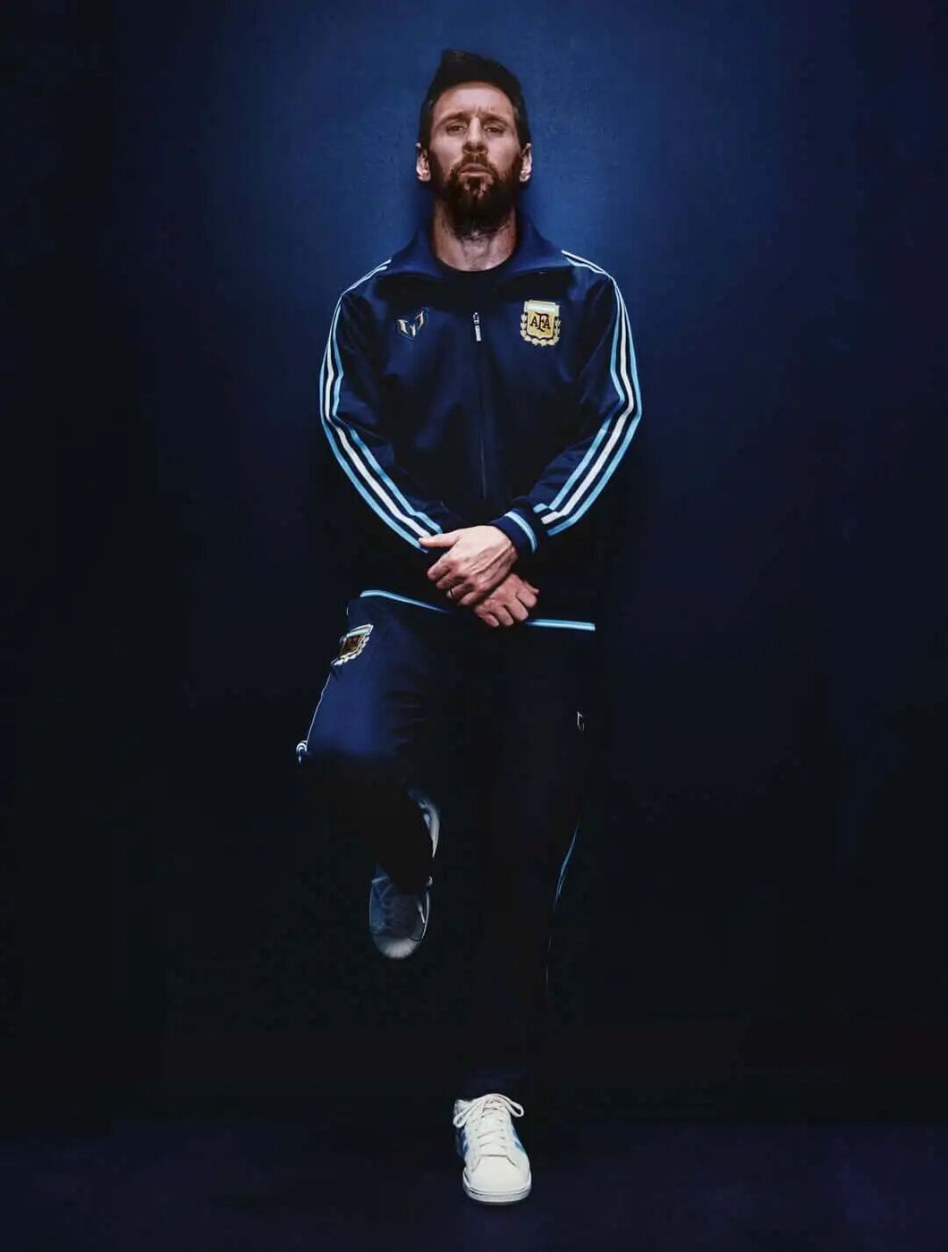 Lionel Messi in the night navy Argentina tracksuit