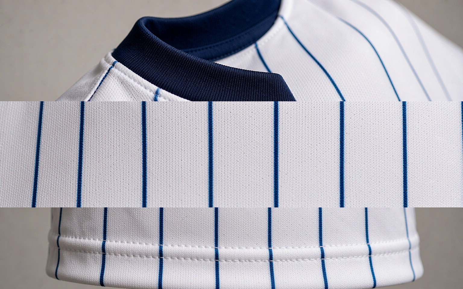 Close-up of football shirt fabric showing knit weave and collar stitching