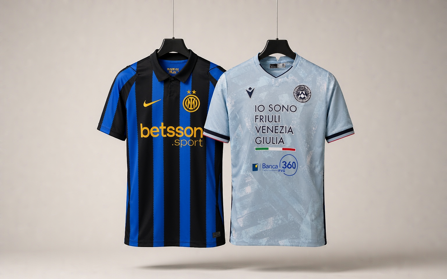 Inter and Udinese shirts hanging on invisible hangers in a bright studio