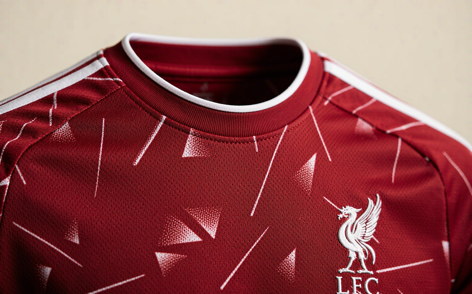 Close-up of football shirt fabric showing knit weave and collar stitching