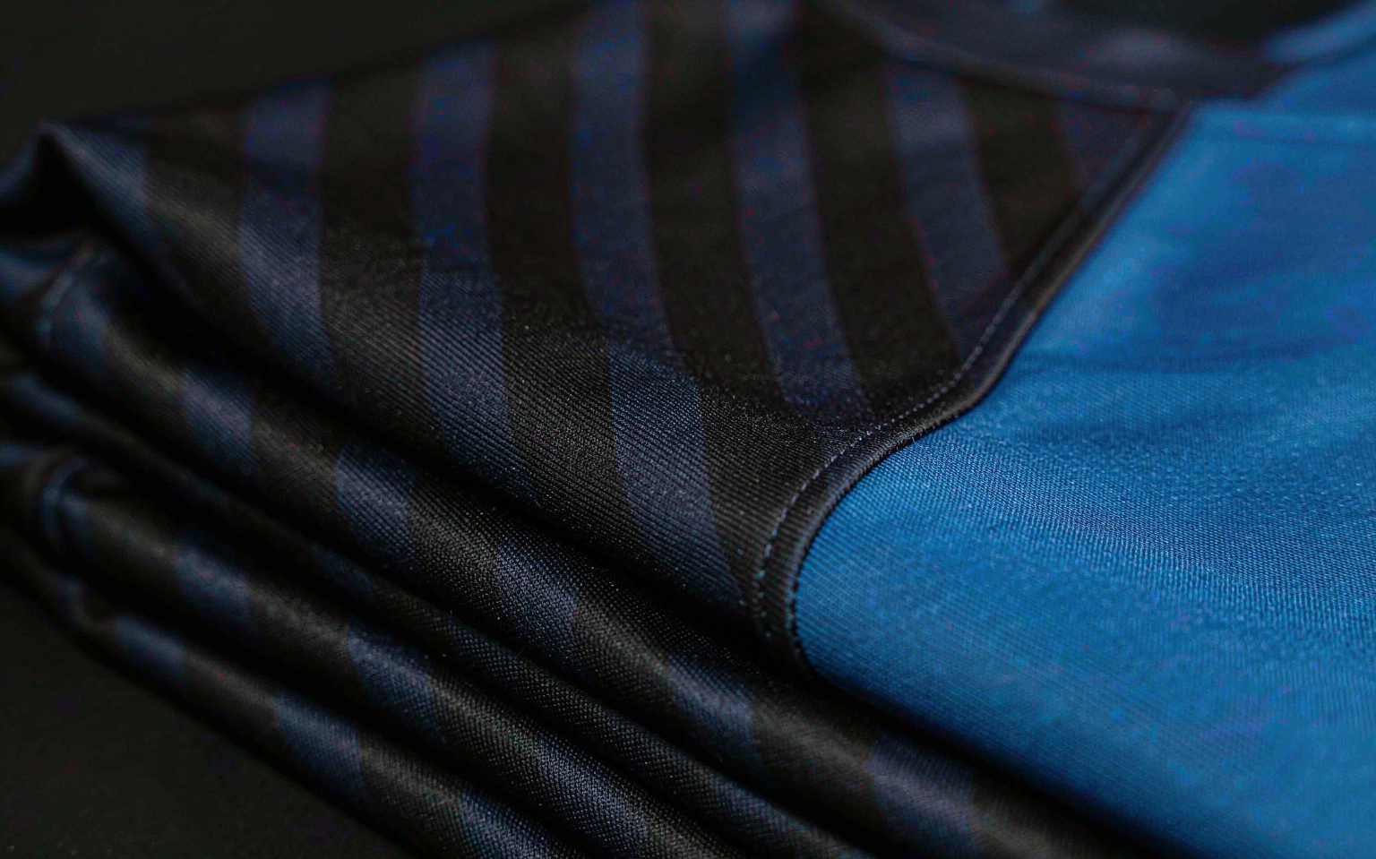 Close-up of navy striped and azure jersey fabric