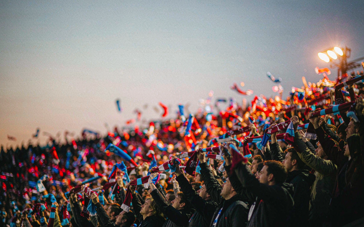 Supporters under the Villa Park floodlights