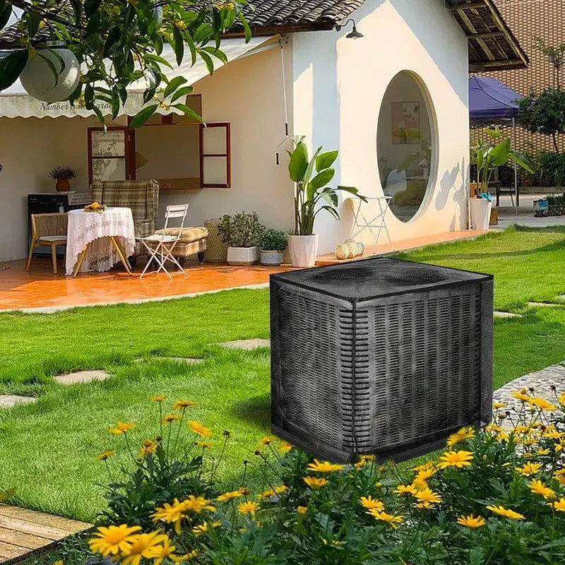 Heavy duty black mesh cover installed over an outdoor air conditioner