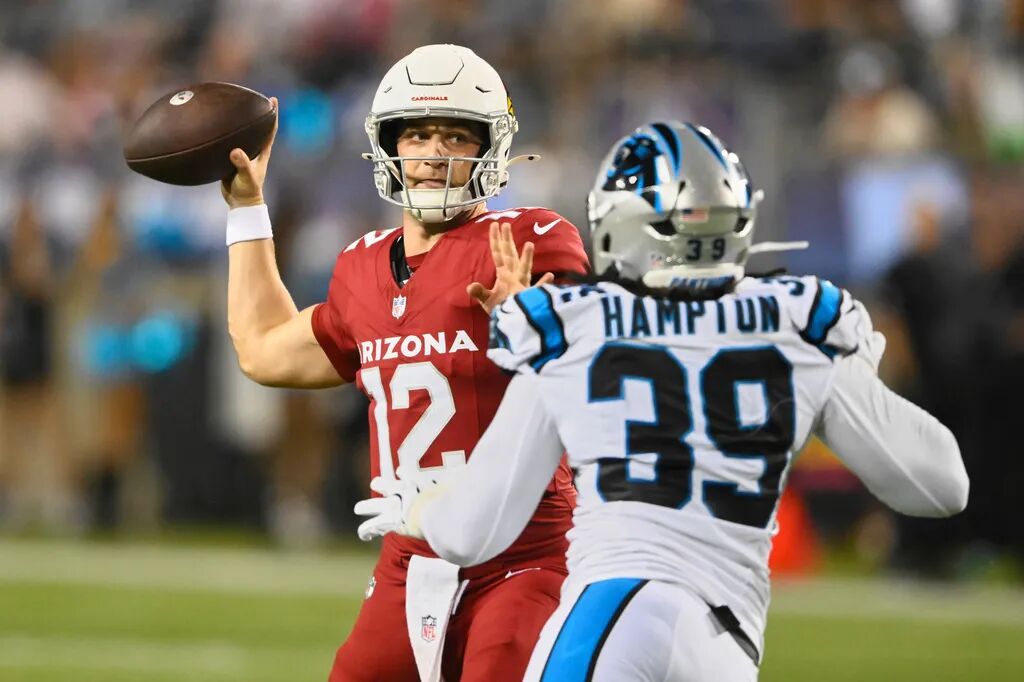 Carolina Panthers QB Haynes King #16 Scrambling Away From Defender