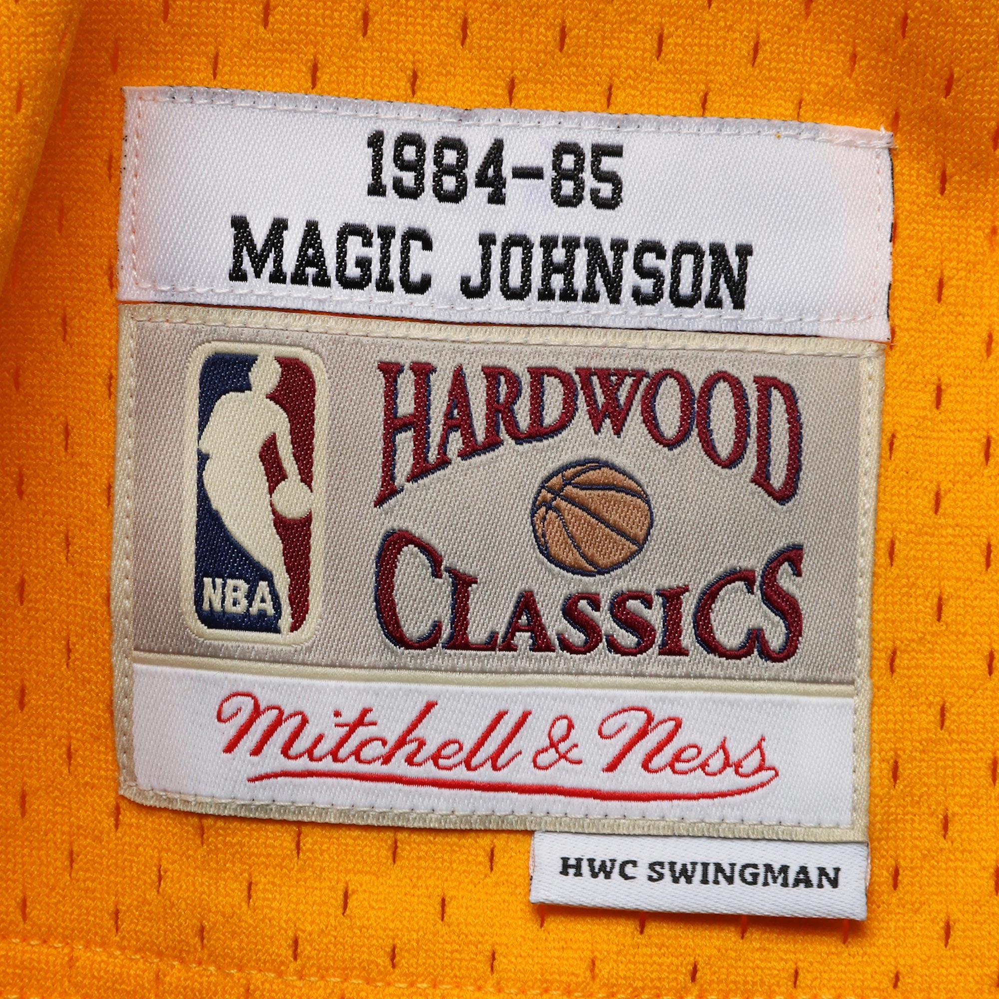 Magic Johnson Los Angeles Lakers Mitchell & Ness 1984/85 Hardwood Classics Swingman Jersey Gold