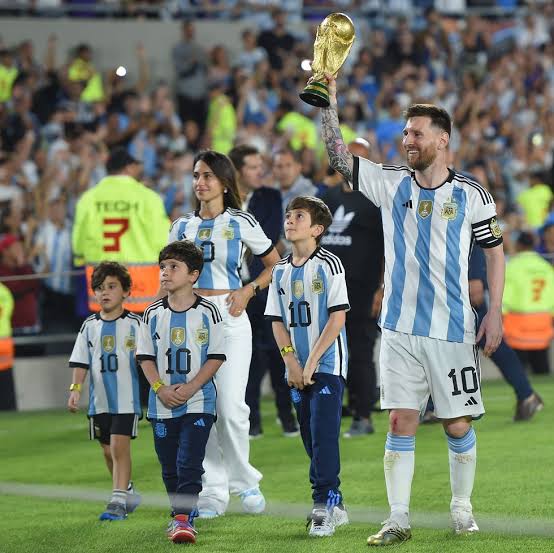 Lionel Messi celebrating World Cup win with family in Argentina jerseys