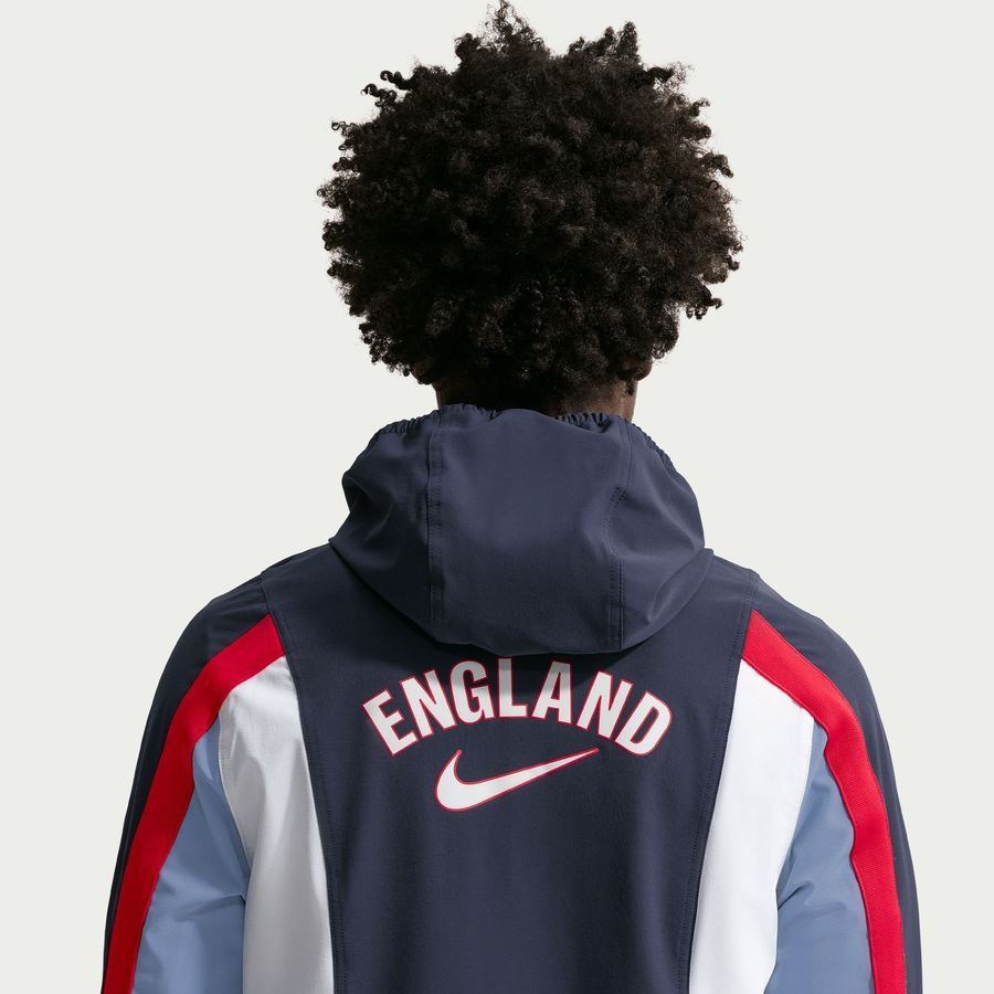 England Track Top Dri-FIT Energy Woven World Cup 2026 - Obsidian/Work Blue/Speed Red-League Fan Gear