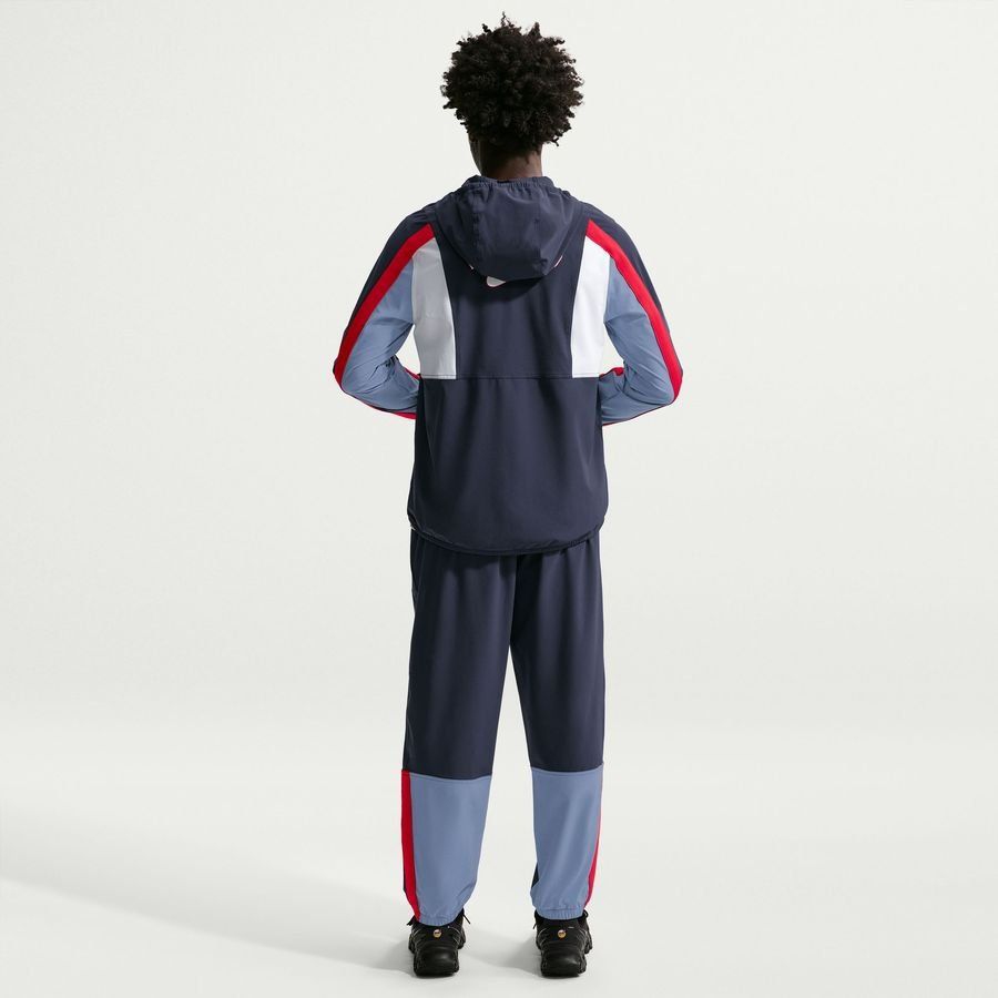 England Track Top Dri-FIT Energy Woven World Cup 2026 - Obsidian/Work Blue/Speed Red-League Fan Gear