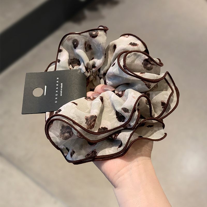 Korean retro high-end paisley double-layer fabric pleated hair tie for creating a voluminous bun or low ponytail
