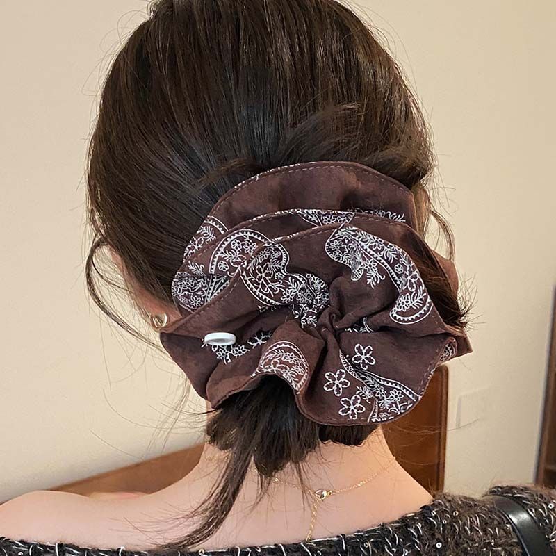 Korean retro high-end paisley double-layer fabric pleated hair tie for creating a voluminous bun or low ponytail