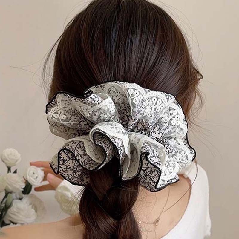 Korean retro high-end paisley double-layer fabric pleated hair tie for creating a voluminous bun or low ponytail