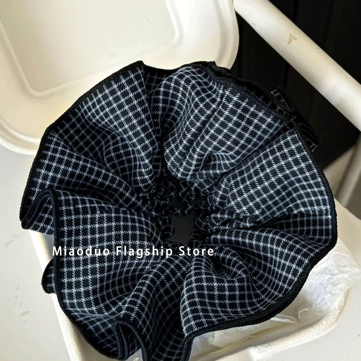 Korean retro high-end paisley double-layer fabric pleated hair tie for creating a voluminous bun or low ponytail