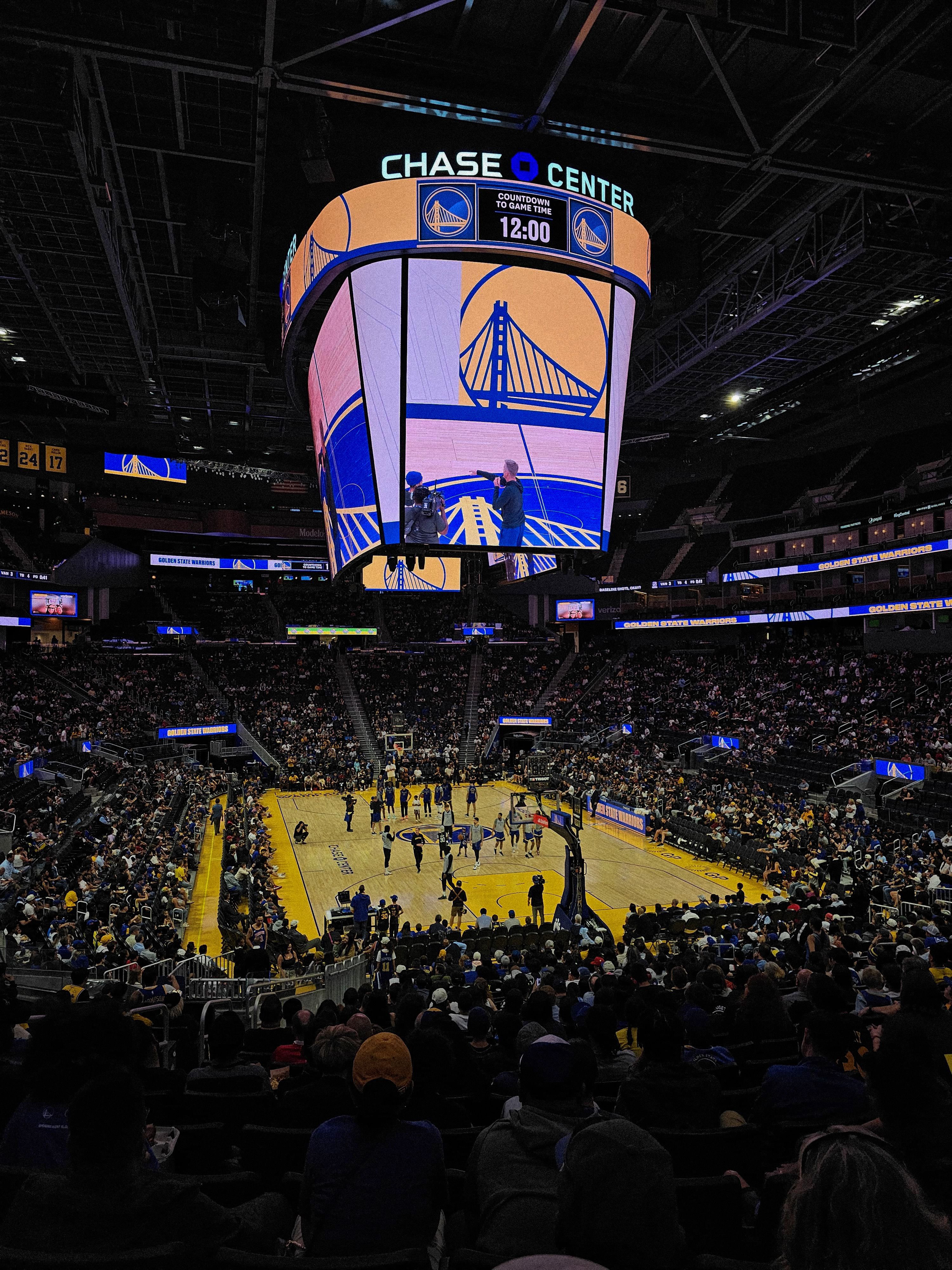 Fast-paced NBA basketball action on the court during a regular season game