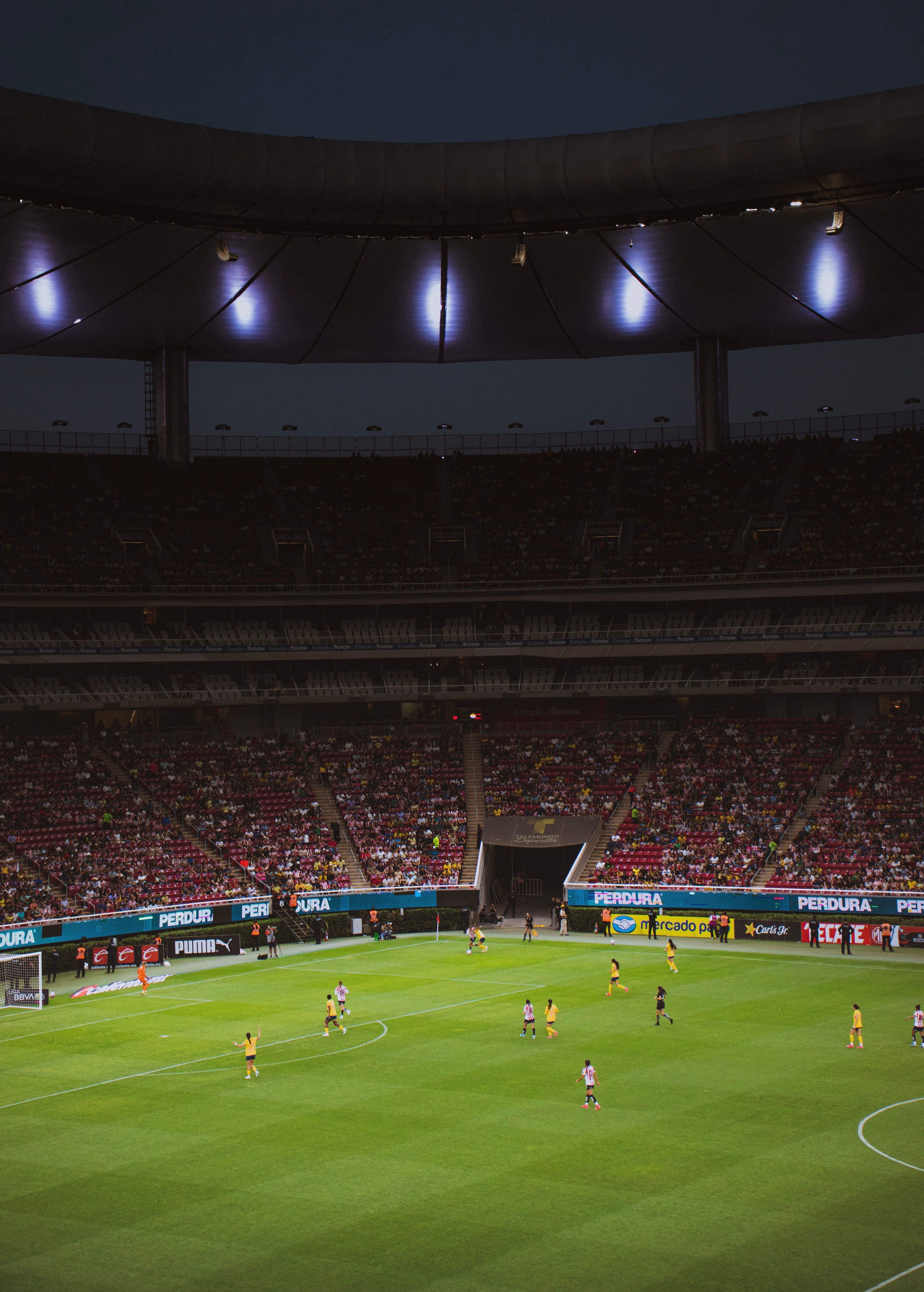 Night football match inside an illuminated stadium ahead of the 2026-27 European club season