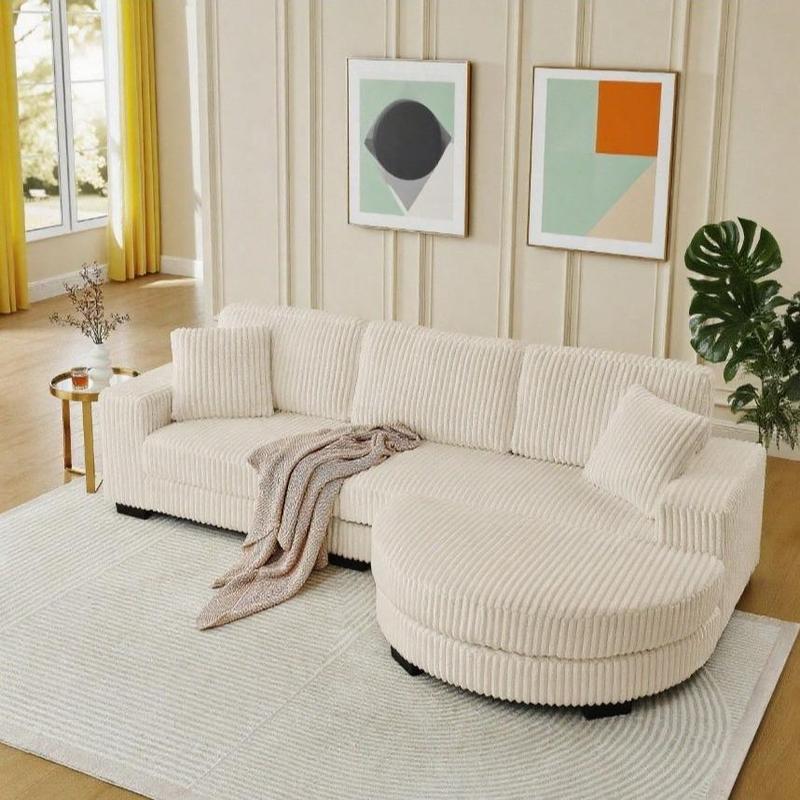 Sofá modular en forma de L (configurable a izquierda o derecha) – Tapizado en tela tipo «borreguito» (teddy) con acabado capitoné, estructura de madera maciza, relleno de espuma; incluye función de sofá cama, otomana y 2 cojines. Ideal para sala de estar 