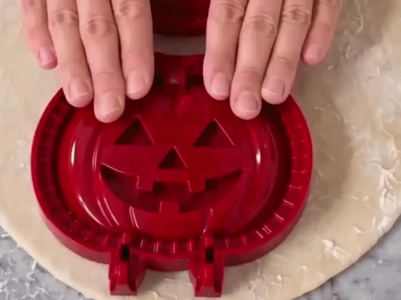 Suggested image: family or friends making Halloween mini pies together in kitchen