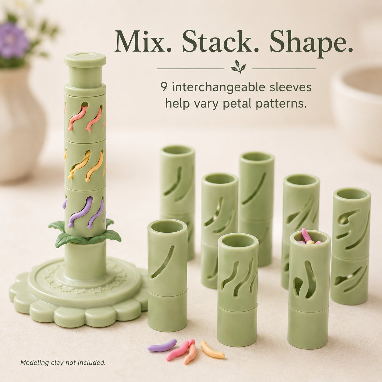 Nine interchangeable sage green shaping sleeves displayed beside the modular bloom maker base