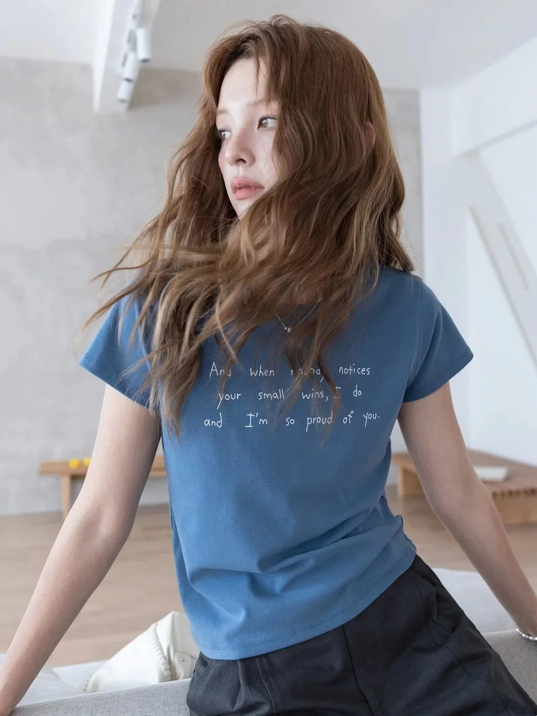 Blue short-sleeved top with straight shoulders