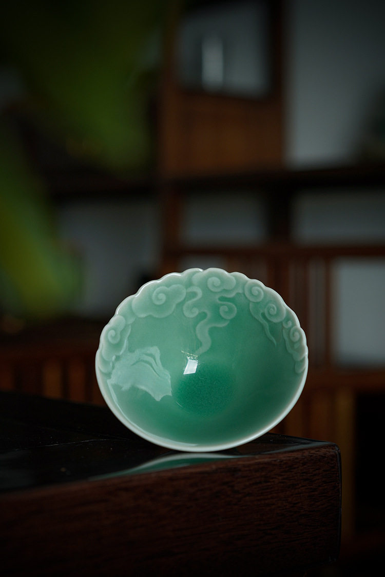 04 7192afb6 596f 4ebf 863c b22e5c6a8732 – Longquan Celadon Embossed Cloud Patterns Teacup by Kungfuyang