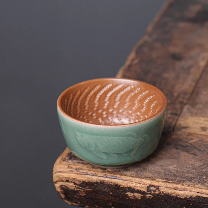 rf40jtsvo – Longquan Celadon Dragon-Fish Plum Green Wood Ash Teacup 90ml by Kungfuyang