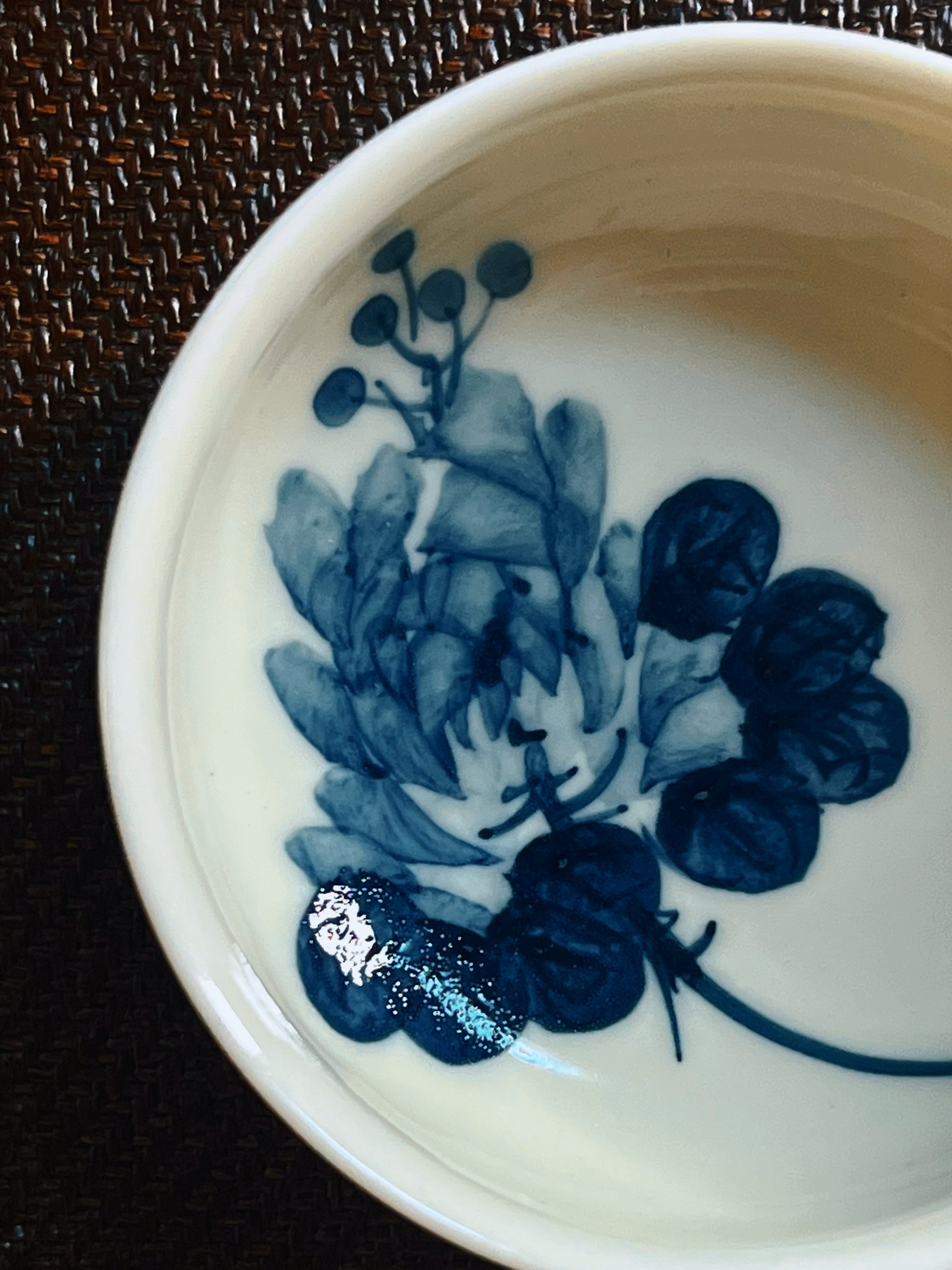 The glaze allows the white kaolin body and the blue decoration to be seen with maximum clarity, like specimens under glass.
