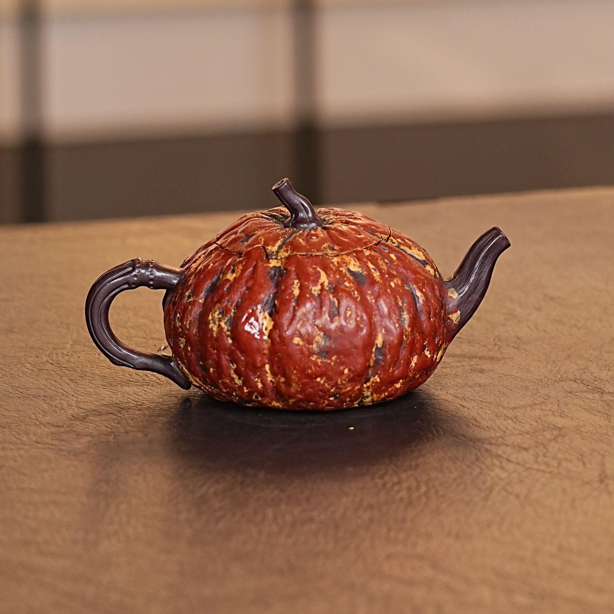 Leaf and curling tendril decoration on lid with pumpkin stem knob hand-sculpted from same purple clay by Kungfuyang