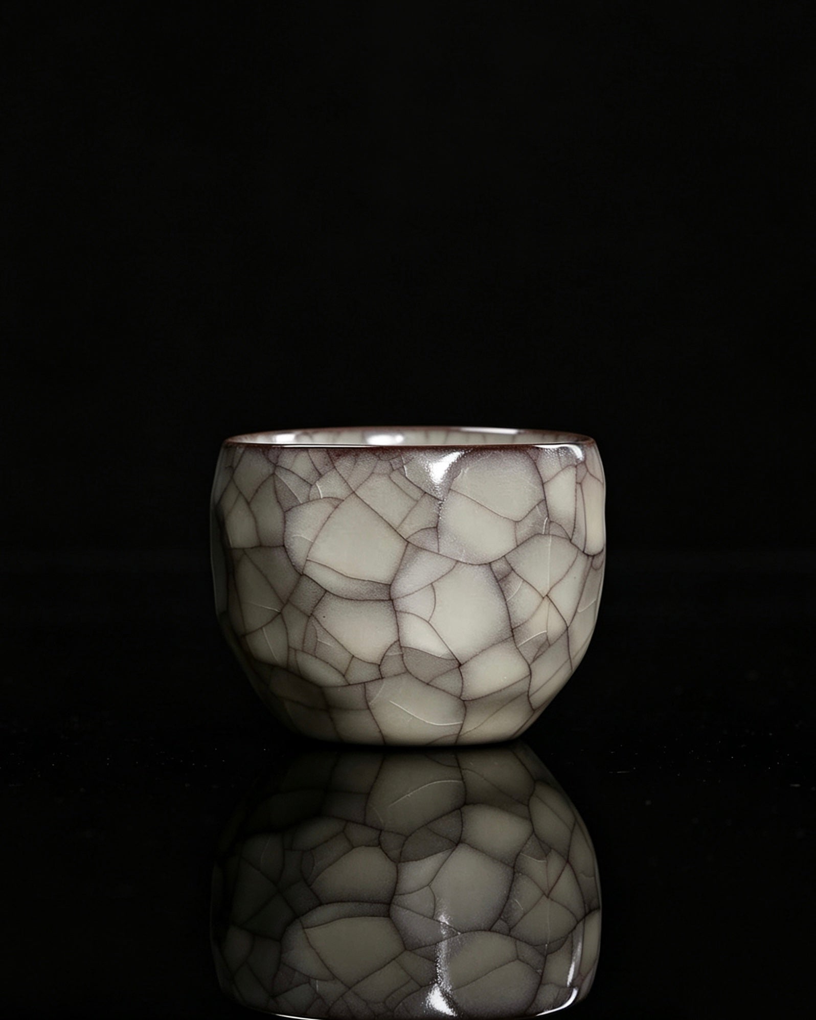 Iron-bodied master cup showing classic Ge kiln double crackle of golden wires and iron threads by Kungfuyang