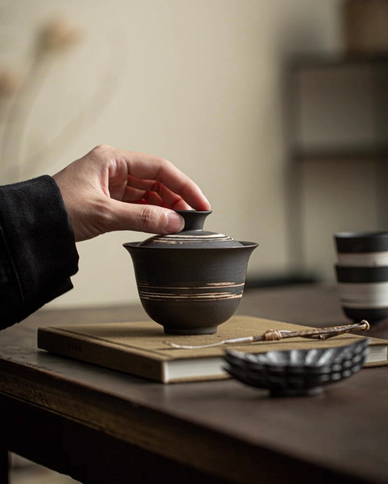 Natural woodfired teabowl with ash deposits, creating unique patterns for contemplative tea drinking by Kungfuyang
