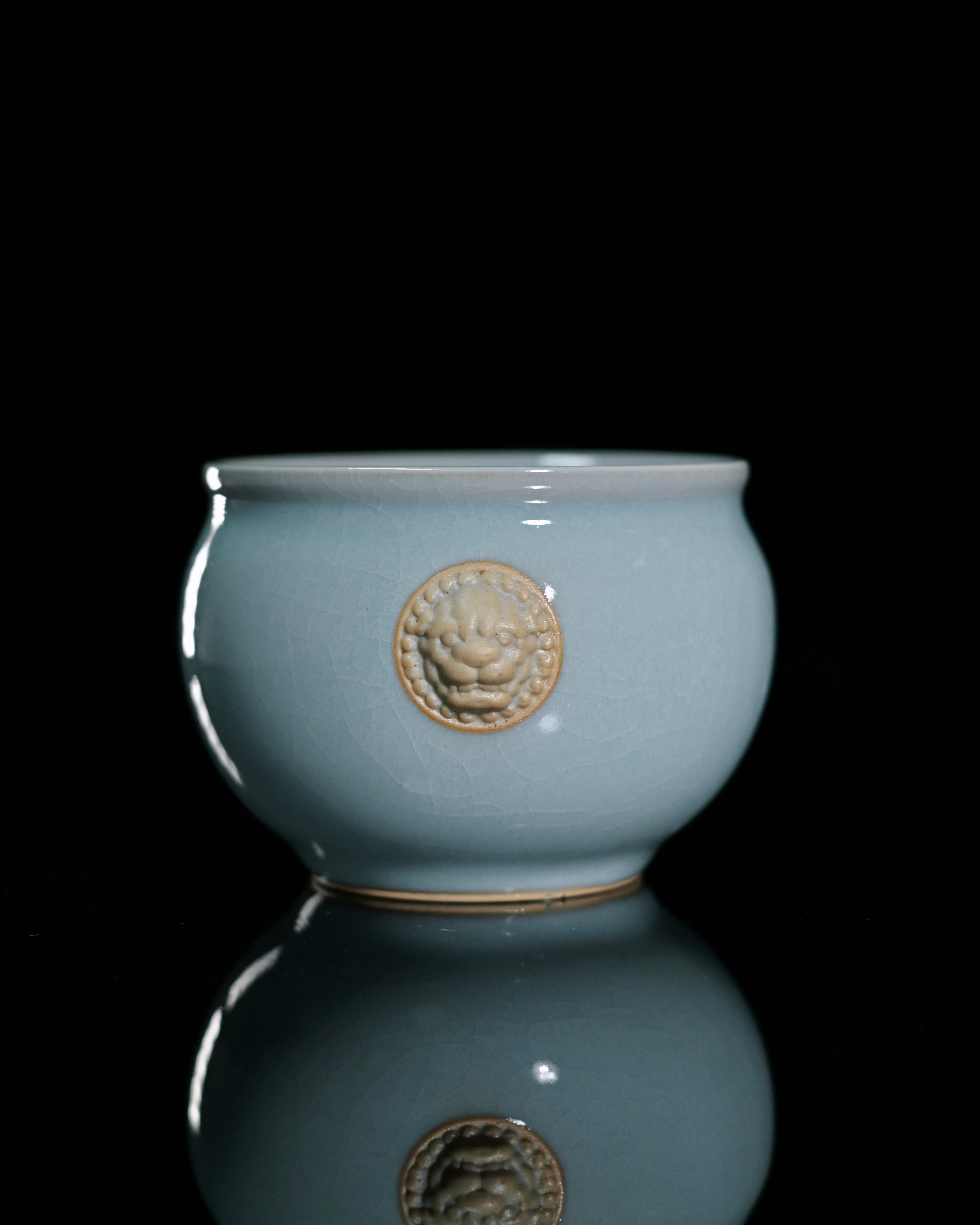 Chinese Ruyao fine crackle sky-blue cup with characteristic Ru ware fissures that will naturally stain amber with repeated