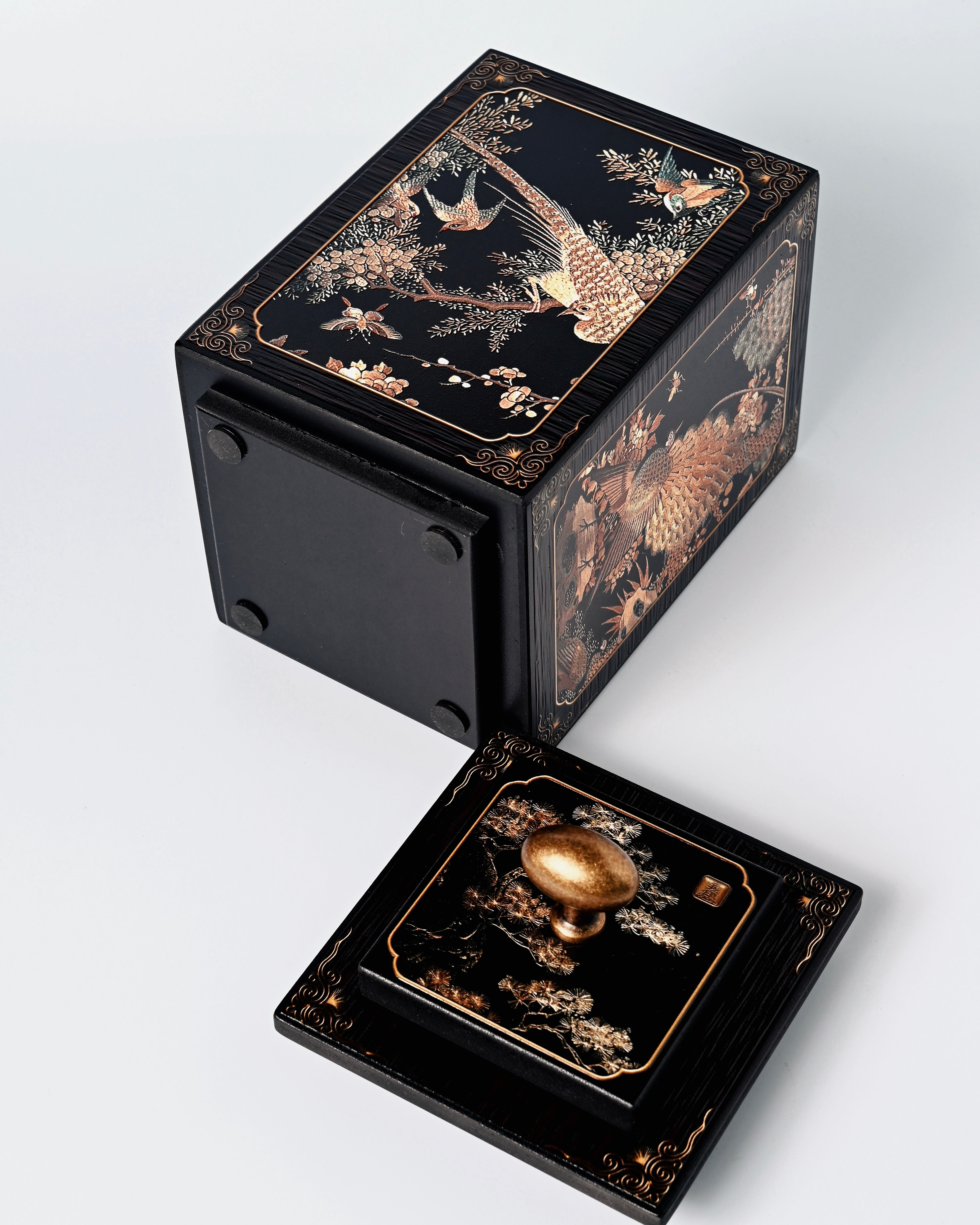 Functional art piece: bamboo charcoal tea caddy with palace lantern form and mythological bird designs by Kungfuyang